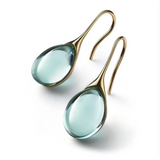 Ohrringe mit eingebettetem Opal