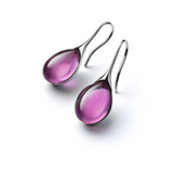 Ohrringe mit eingebettetem Opal